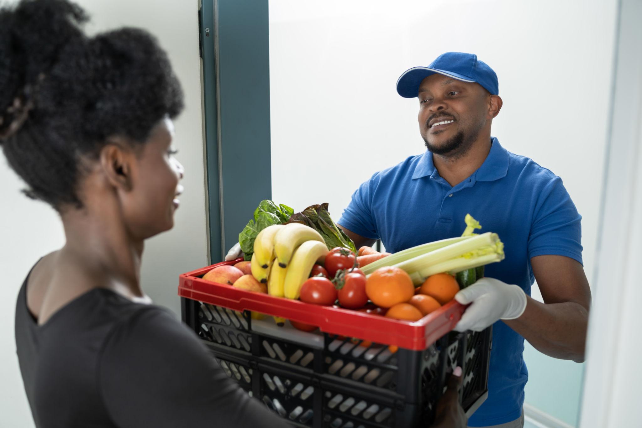 Delivering packaged groceries to a customer's door